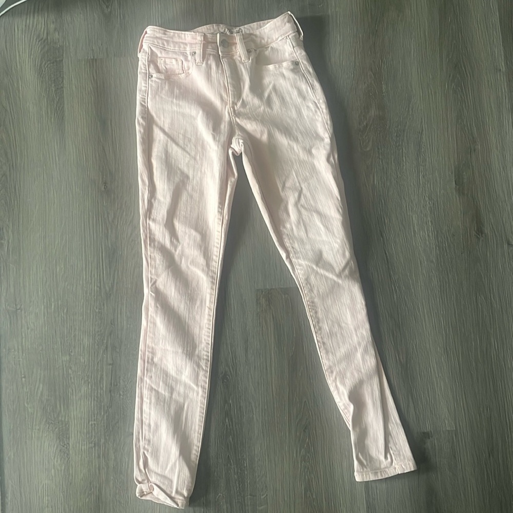 Pink jeans. Stretchy and comfortable. Size 24 regular length. Never worn